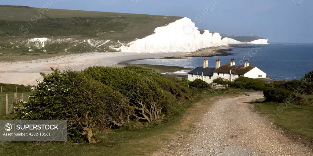 England, East Sussex, Cuckmere Haven. A view toward the Seven Sisters chalk cliff formation.