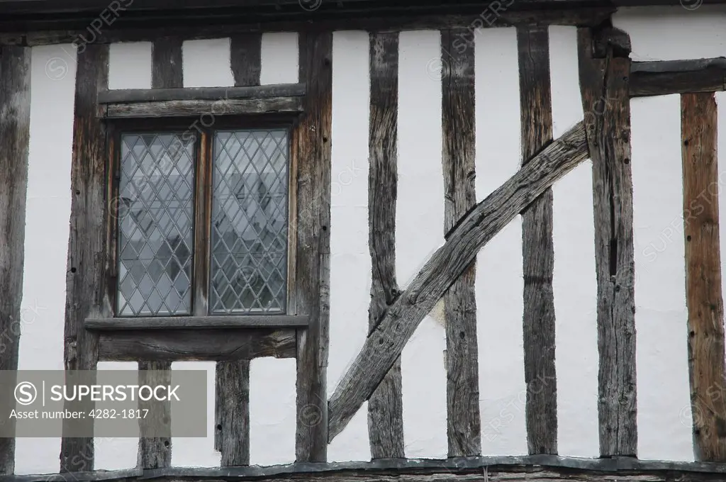 England, Suffolk, Lavenham. The Tudor beamed facia of a house in the Suffolk village of Lavenham.