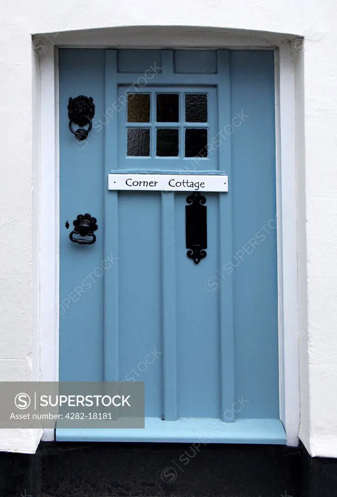 England, West Sussex, Bosham. The blue front door of Corner Cottage in Bosham village.