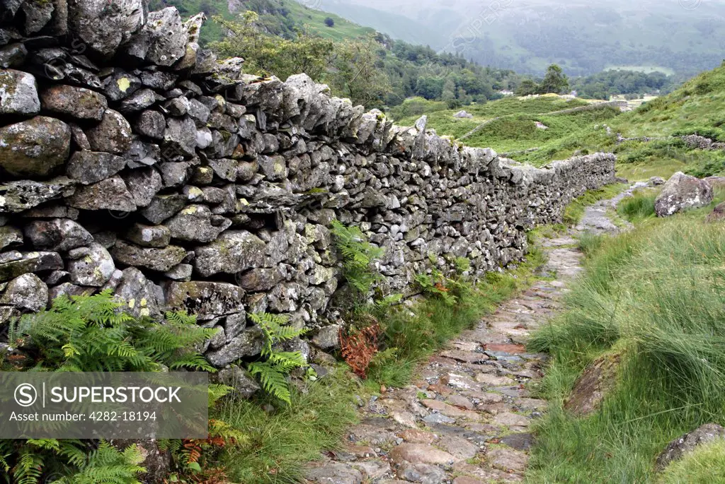 England, Cumbria, Grasmere. Path from Easedale Tarn to Grasmere.
