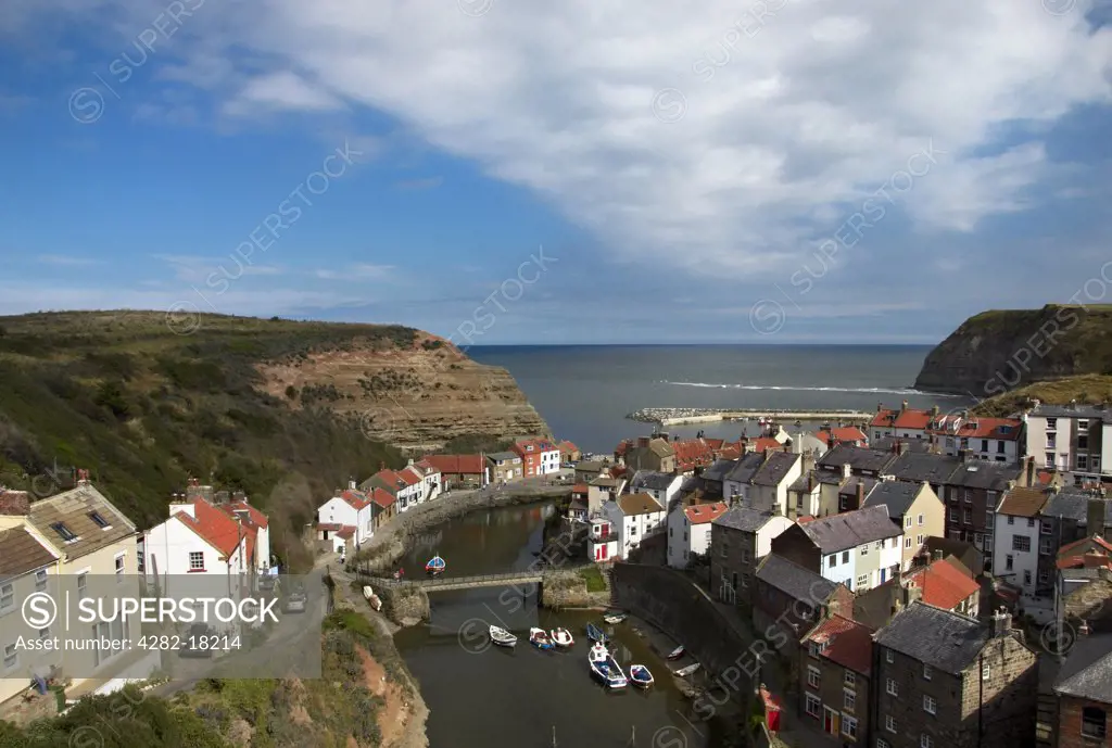 England, North Yorkshire, Staithes. A view from above Staithes village.