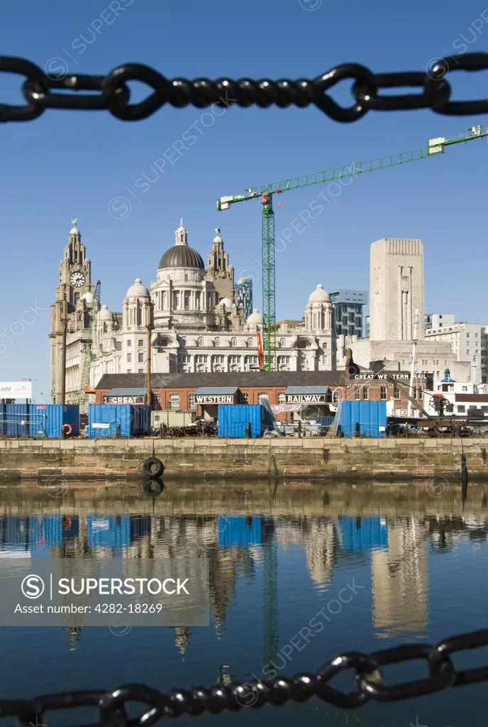 England, Merseyside, Liverpool. Albert Docks and waterfront with the Royal Liver Building in the distance.