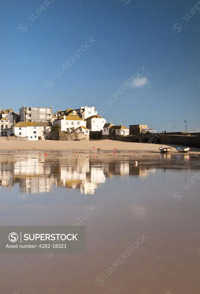 England, Cornwall, St. Ives. Buildings reflected in the low tide at St. Ives.