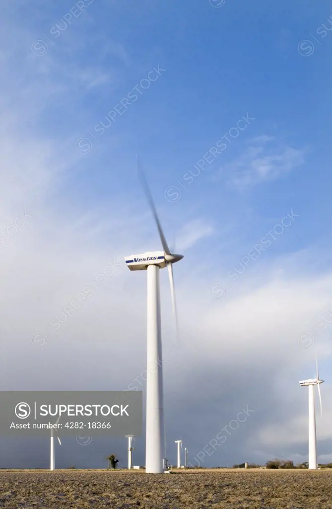 England, Norfolk, -. Wind turbines on a wind farm in Norfolk.