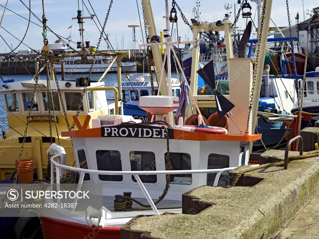 England, North Yorkshire, Scarborough. Fishing boats moored in Scarborough Harbour.