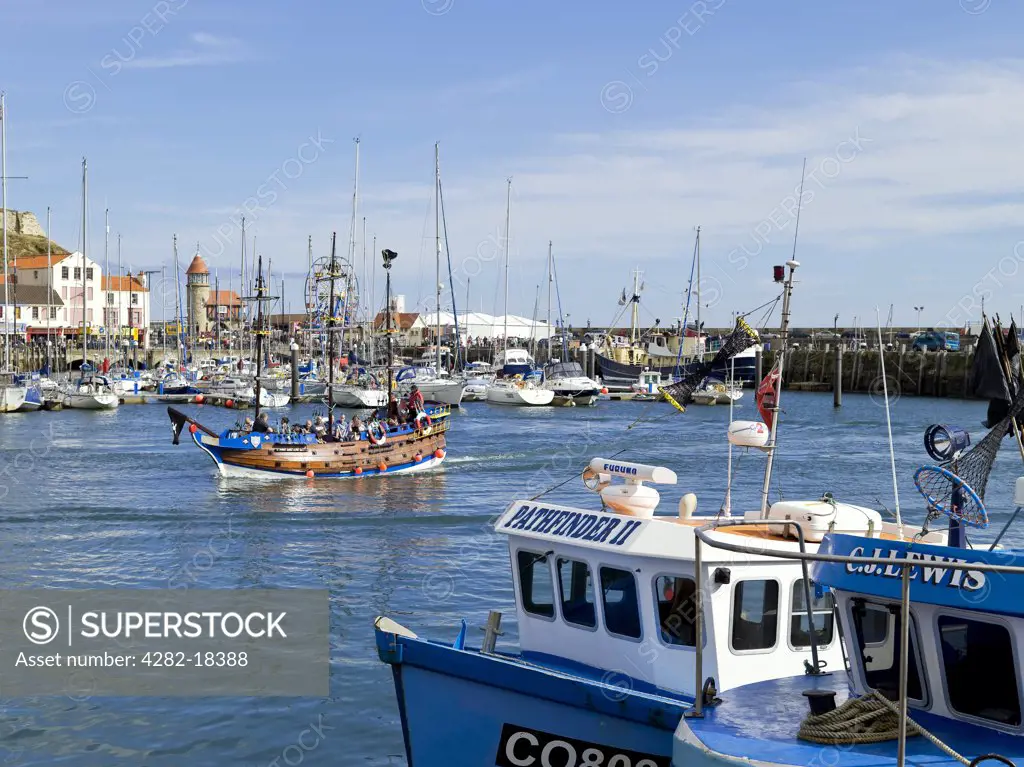 England, North Yorkshire, Scarborough. Yachts and fishing boats moored in Scarborough Harbour.