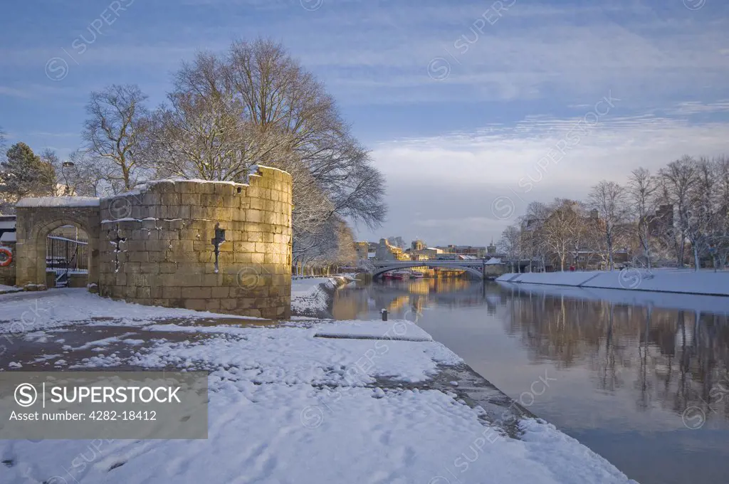 England, North Yorkshire, York. View from the Water Tower and Riverside Walk along the River Ouse towards Lendal Bridge in winter.