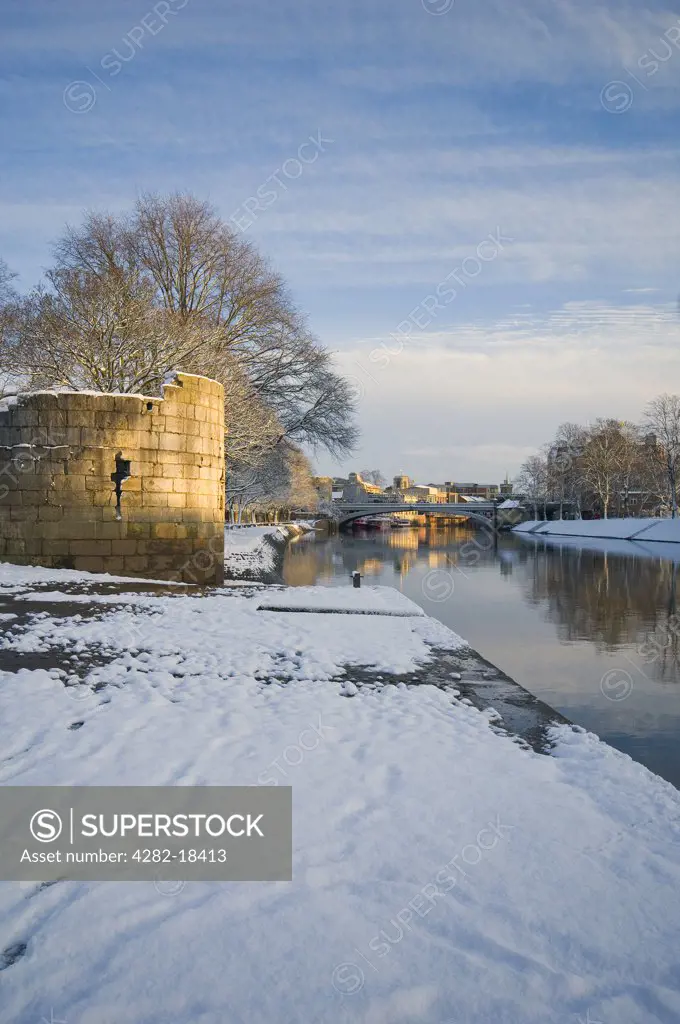 England, North Yorkshire, York. View from the Water Tower and Riverside Walk along the River Ouse towards Lendal Bridge in winter.