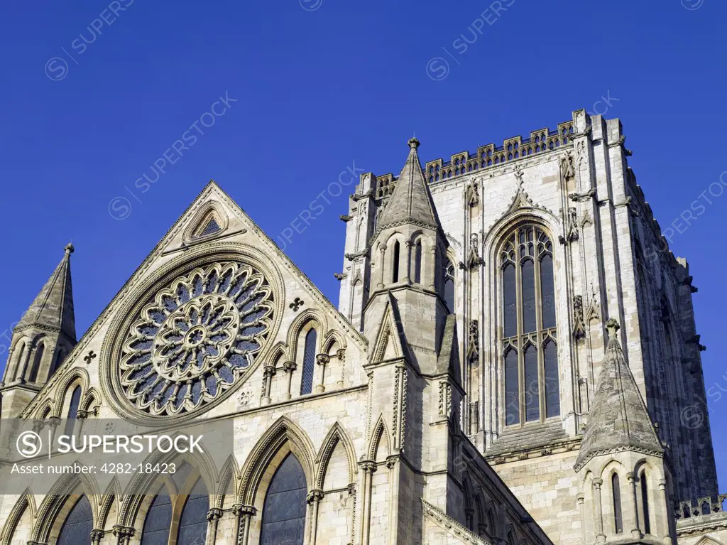England, North Yorkshire, York. The Rose Window and Central Tower of York MInster. The Minster, built between 1220 and 1472, is the largest gothic cathedral in northern Europe.