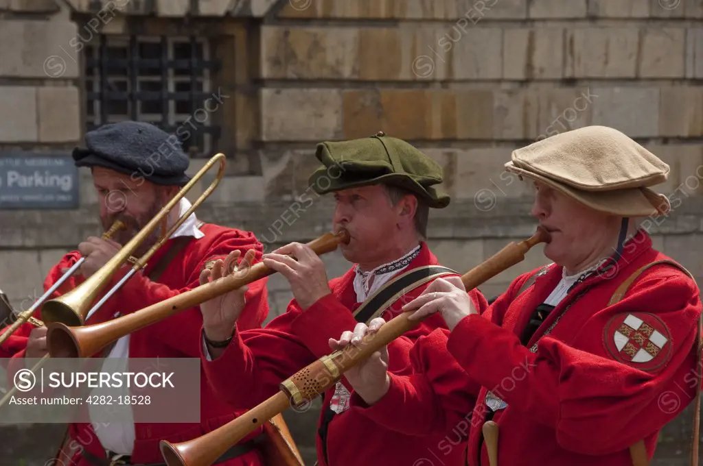 England, North Yorkshire, York. York Waits musicians performing at the York Mystery Plays, a Middle English cycle of forty-eight mystery plays, or pageants, which cover sacred history from the creation to the Last Judgement.