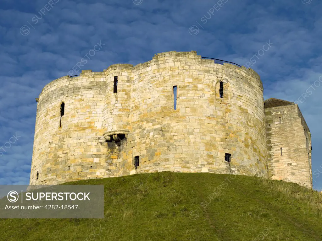 England, North Yorkshire, York. Clifford's Tower, built in the 13th century replacing an original timber keep burnt down during a siege by citizens of the Jewish community in 1190.