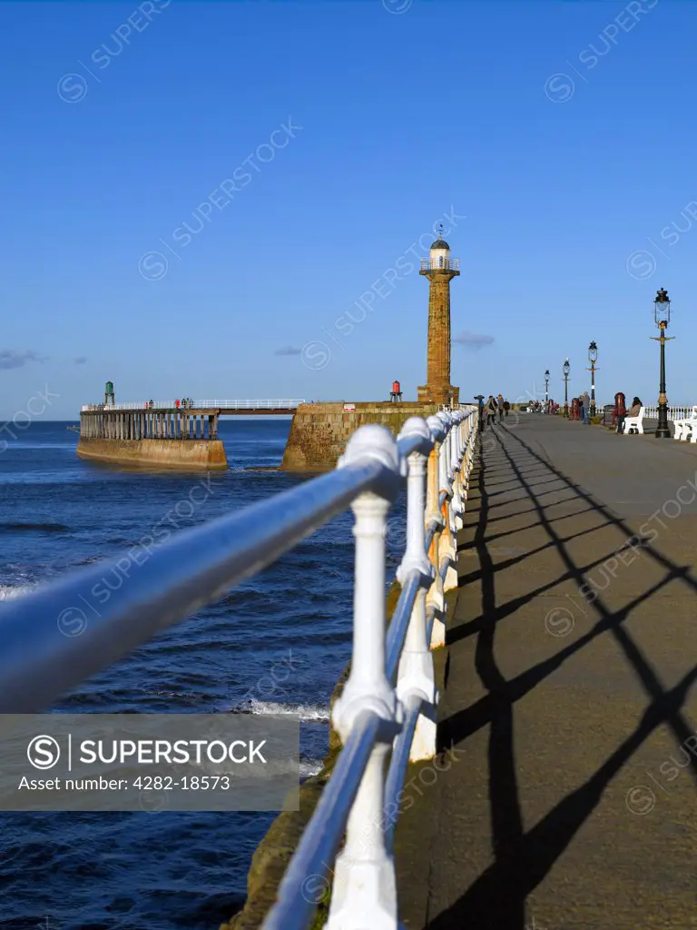 England, North Yorkshire, Whitby. Whitby West Pier Light (Old) built in 1831 on the West Pier. The lighthouse was replaced by Whitby West Pier Light (New) at the end of the pier and is open as an historic attraction.