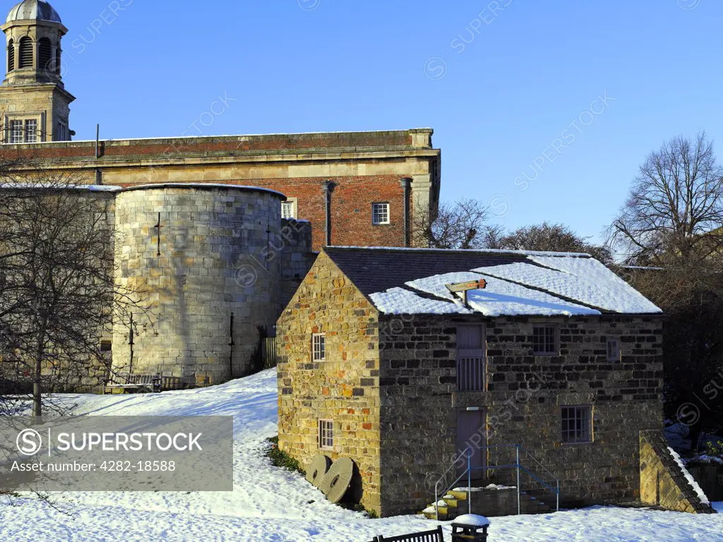 England, North Yorkshire, York. Raindale Mill, a reconstructed early 19th century flour mill at York Castle Museum in winter.