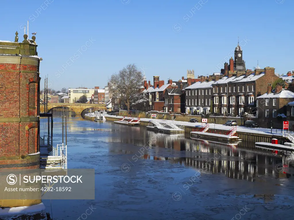 England, North Yorkshire, York. Snow covered landings on the River Ouse by the South Esplanade in winter.