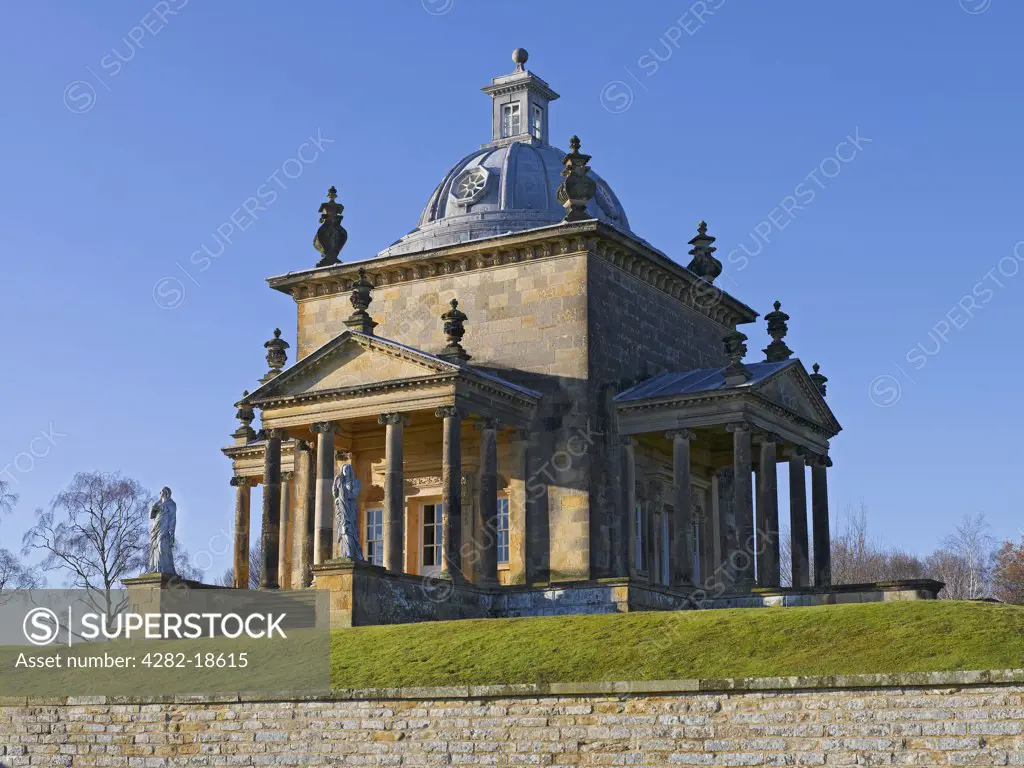 England, North Yorkshire, Castle Howard. The Temple of the Four Winds, designed by Sir John Vanbrugh, in the gardens of Castle Howard.