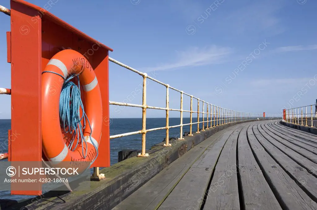 England, North Yorkshire, Whitby. Life Belts on the West Pier at Whitby.