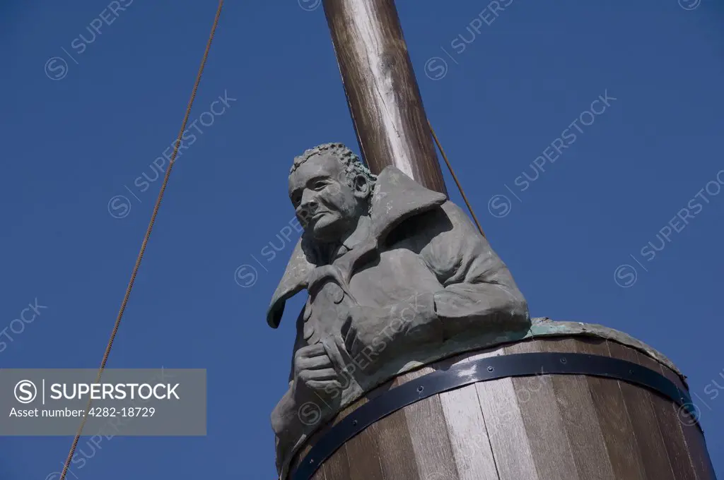 England, North Yorkshire, Whitby. Commemorative statue to the Scoresbys of a lookout in a crows nest overlooking Whitby harbour. William Scoresby from Whitby invented the crows nest which was used in the fishing and whaling industry.