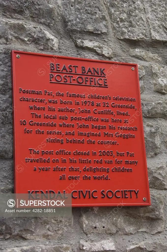 England, Cumbria, Kendal. A plaque outside the old Beast Bank post office in Kendal where John Cunliffe, author of Postman Pat, began his research for the series.