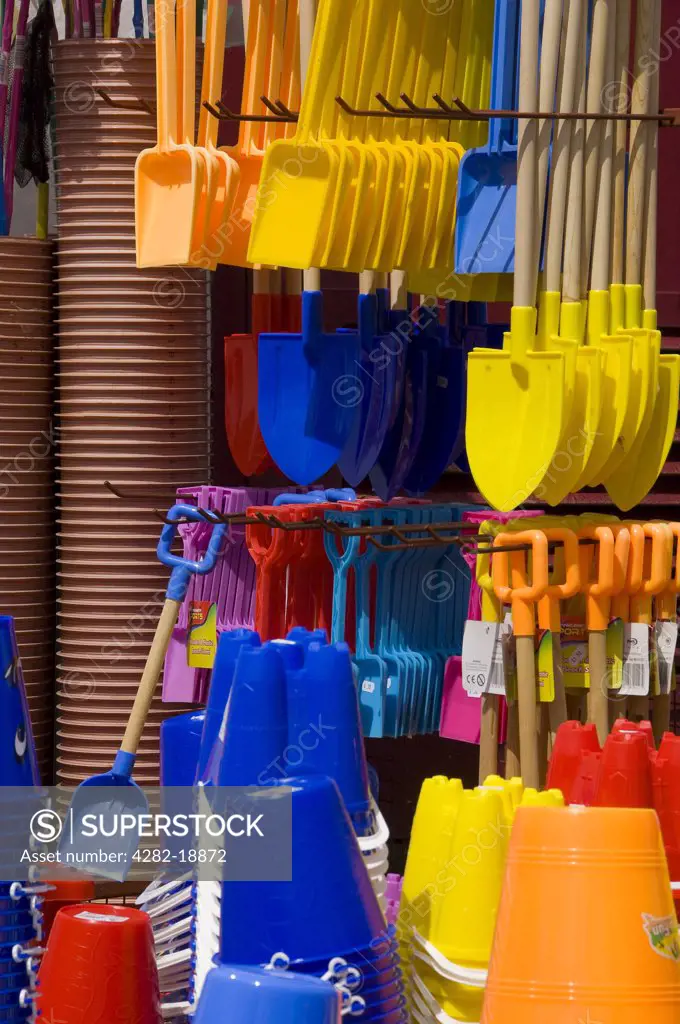 England, East Riding of Yorkshire, Bridlington. Traditional seaside shop selling colourful buckets and spades.