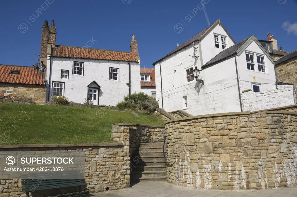 England, North Yorkshire, Robin Hoods Bay. Cottages on the seafront. Robin Hoods Bay is the end of the Wainwright Coast to Coast Walk across the North of England which starts at St Bees in Cumbria.