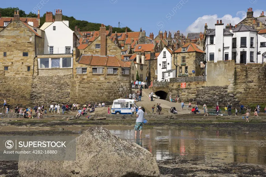 England, North Yorkshire, Robin Hoods Bay. The seashore at Robin Hoods Bay. The village marks the end of the Wainwright Coast to Coast Walk across the North of England which starts at St Bees in Cumbria.