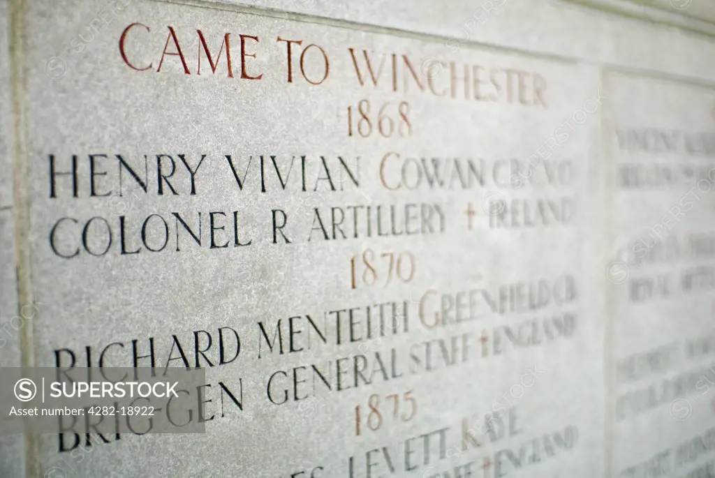 England, Hampshire, Winchester. Detail of war memorial at Winchester College. Winchester College was founded in the fourteenth century by William of Wykeham, Bishop of Winchester and Chancellor to Richard II.