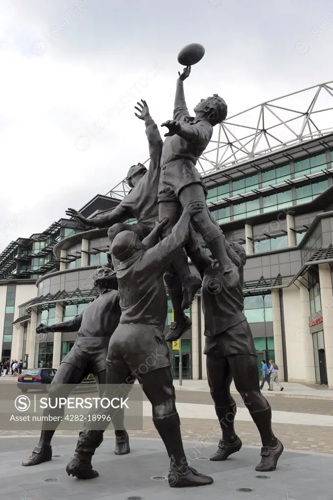 England, London, Twickenham. A line-out statue by Gerald Laing outside Twickenham Stadium, home of England rugby.