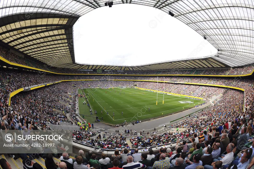 England, London, Twickenham. A game of Rugby Union in front of a sell out crowd at Twickenham Stadium, the home of England rugby. Twickenham is the largest dedicated rugby union venue in the world.