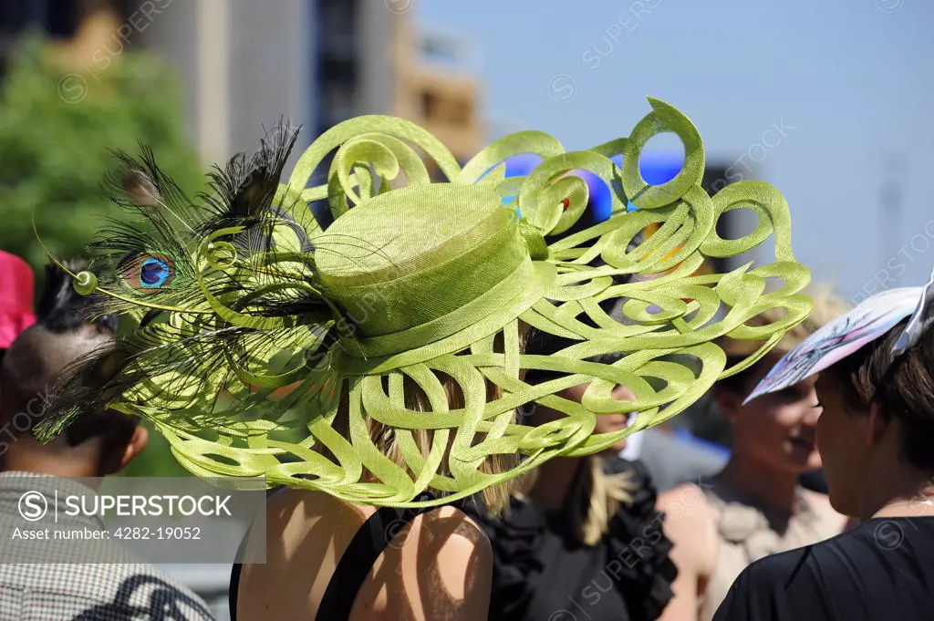 England, Berkshire, Ascot. An elaborate hat worn by a woman attending day two of Royal Ascot 2010.