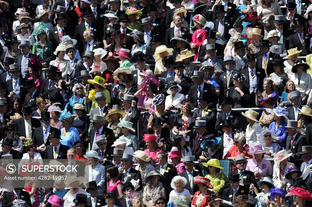 England, Berkshire, Ascot. A large crowd of smartly dressed racegoers in attendance in the Royal Enclosure during day two of Royal Ascot 2010.