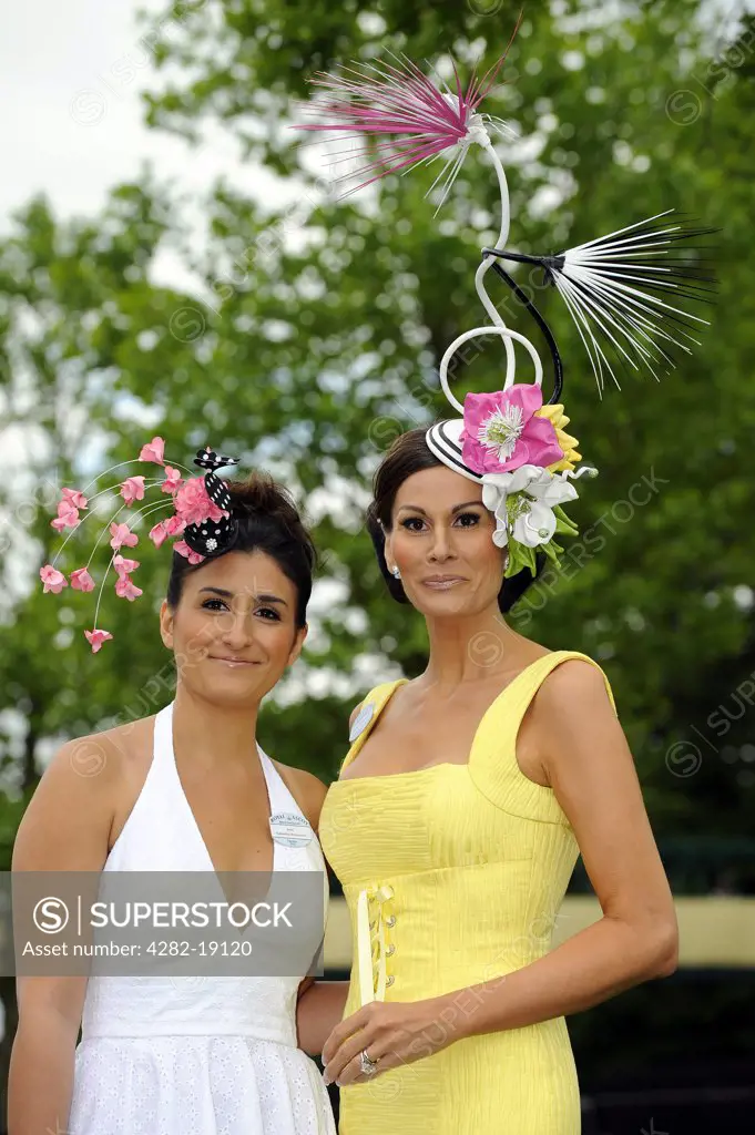 England, Berkshire, Ascot. Isabell Kristensen (r) and guest attending day one of Royal Ascot.