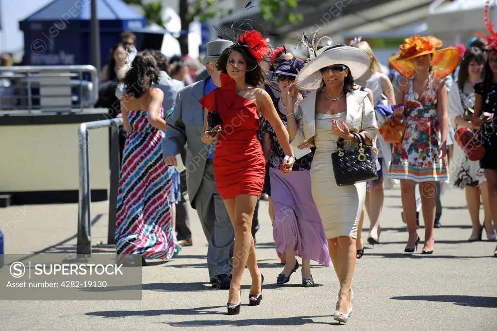 England, Berkshire, Ascot. Elegantly dressed women arriving for day three of Royal Ascot 2010.