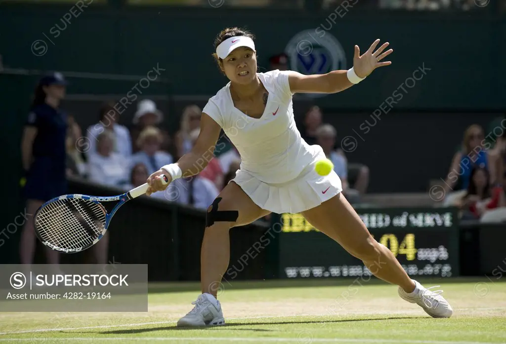 England, London, Wimbledon. Na Li (CHN) in action during the Wimbledon Tennis Championships 2010.