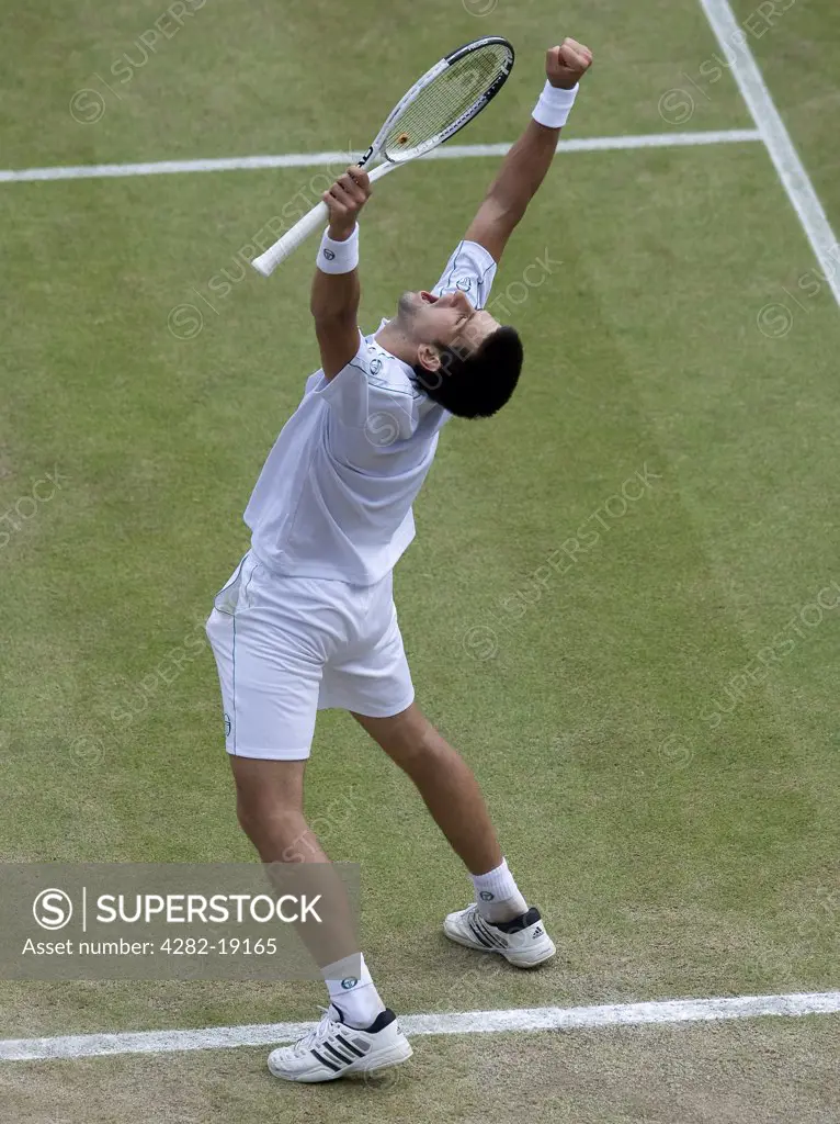 England, London, Wimbledon. Novak Djokovic (SRB) celebrates during the Wimbledon Tennis Championships 2010.