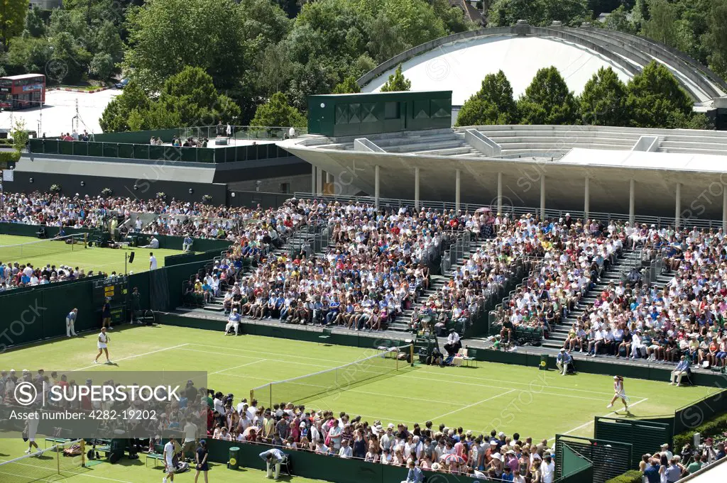 England, London, Wimbledon. View over a match being played on Court 5 at the Wimbledon Tennis Championships 2010.