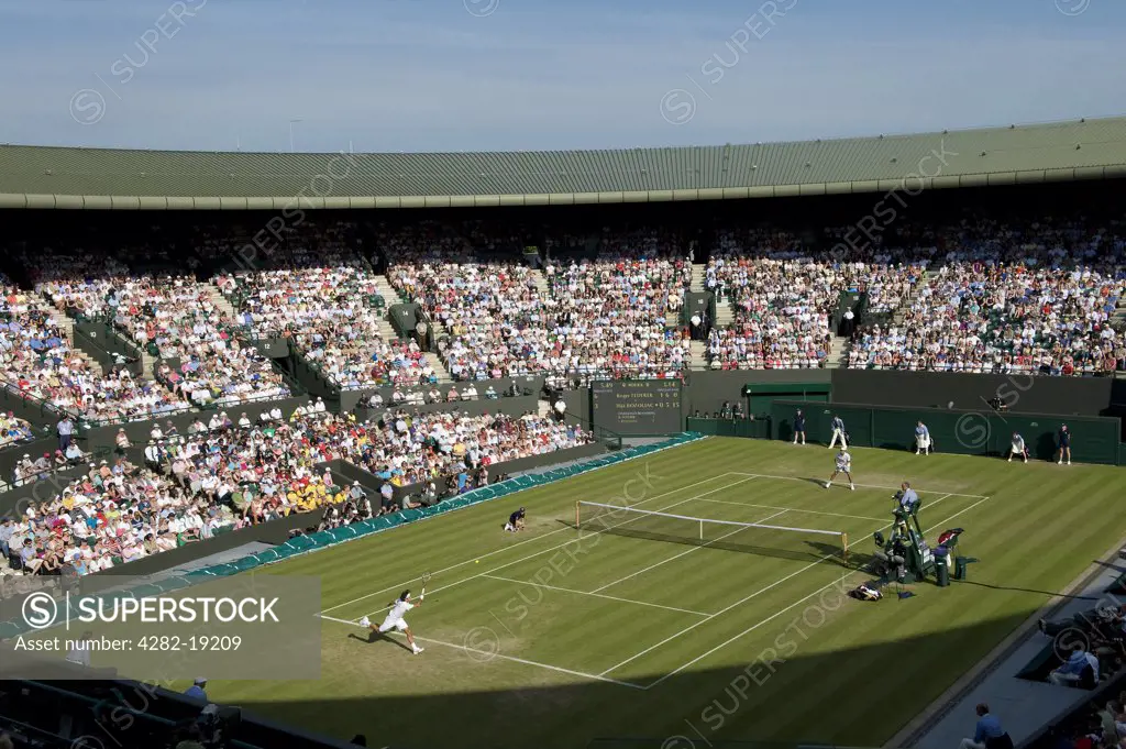England, London, Wimbledon. Action from a mens singles match on Court no. 1 at the Wimbledon Tennis Championships 2010.