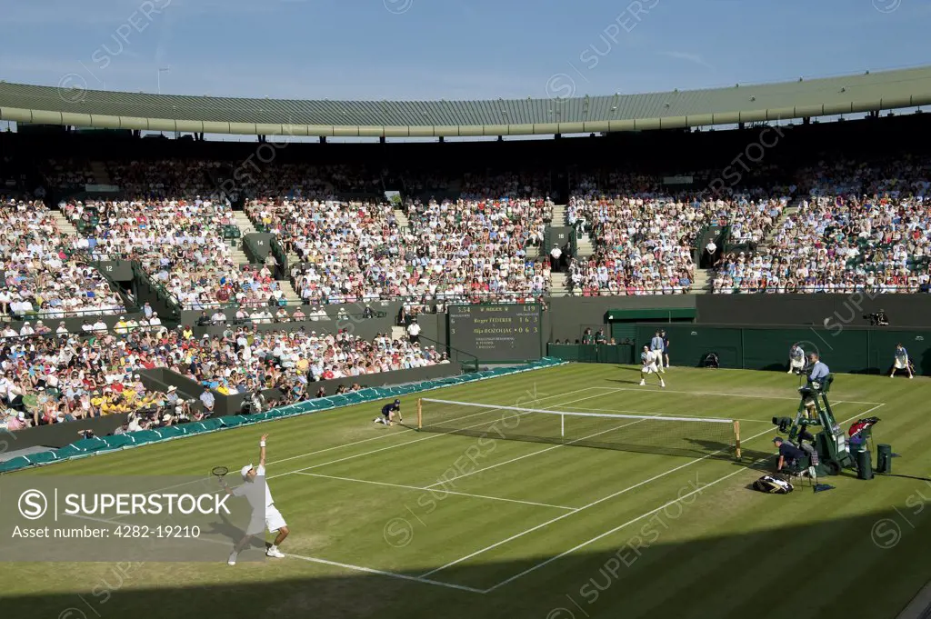 England, London, Wimbledon. Action from a mens singles match on Court no. 1 at the Wimbledon Tennis Championships 2010.