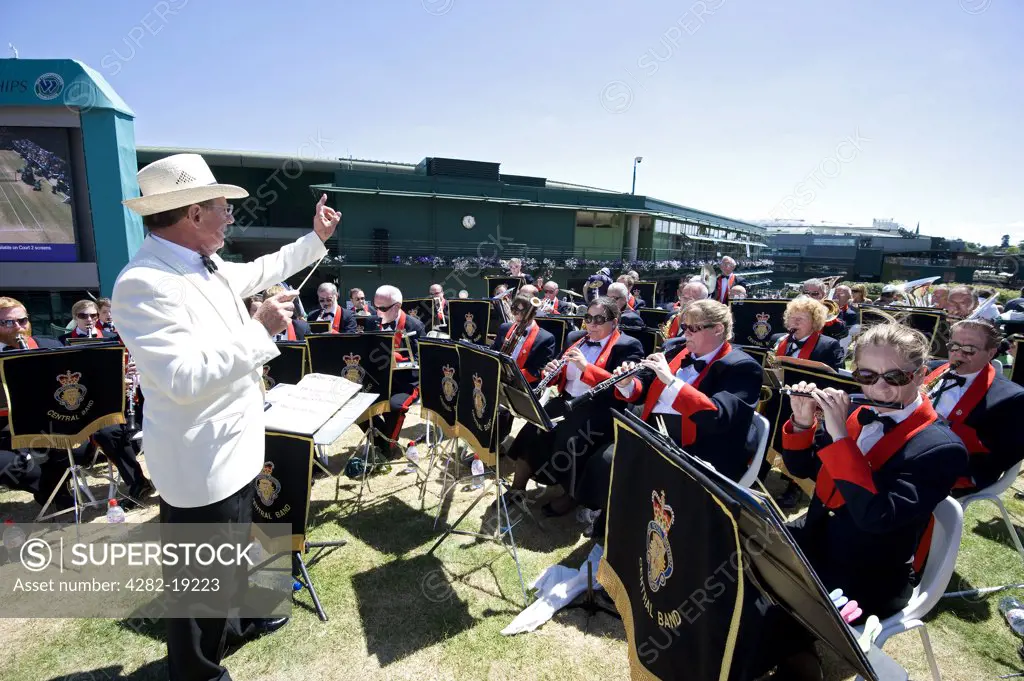 England, London, Wimbledon. The Central Band of The Royal British Legion entertaining the crowd before the mens singles final during the Wimbledon Tennis Championships 2010.