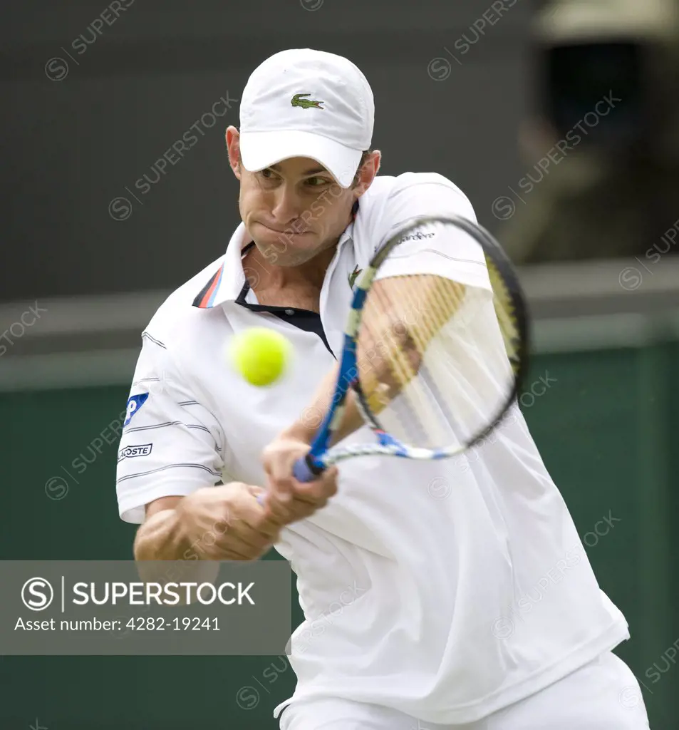 England, London, Wimbledon. Andy Roddick (USA) in action during the Wimbledon Tennis Championships 2010.