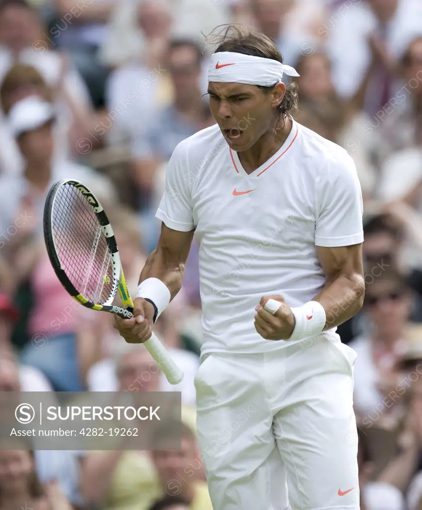 England, London, Wimbledon. Rafael Nadal (ESP) celebrates during the Wimbledon Tennis Championships 2010.