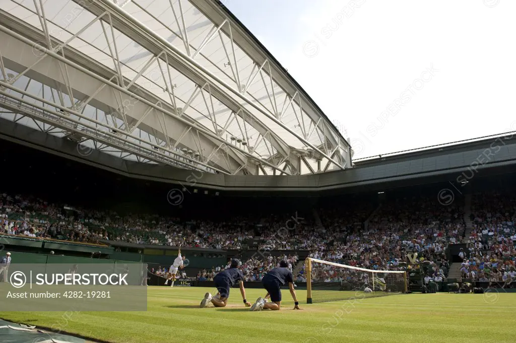 England, London, Wimbledon. Action on Centre Court at the Wimbledon Tennis Championships 2010.