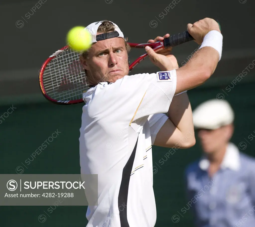 England, London, Wimbledon. Lleyton Hewitt (AUS) in action during the Wimbledon Tennis Championships 2010.