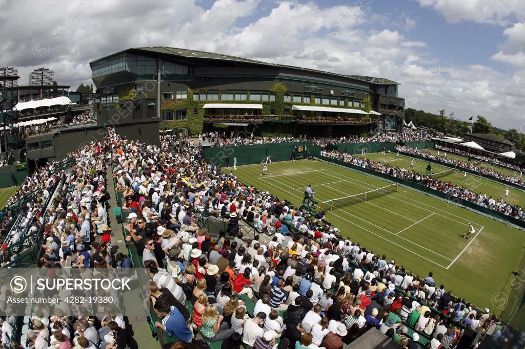 England, London, Wimbledon. View from the crows nest of Court 3 with centre court in the background during the Wimbledon Tennis Championships 2008.