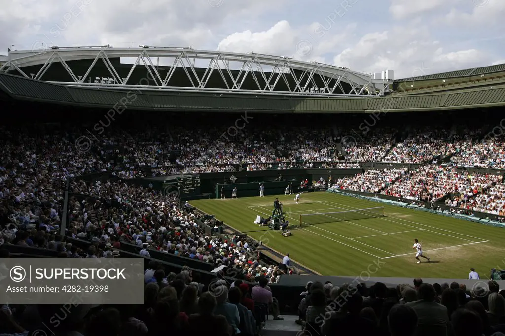 England, London, Wimbledon. View of Centre Court from the royal box end showing the new roof trusses during the Wimbledon Tennis Championships 2008.