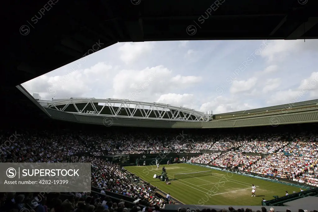 England, London, Wimbledon. View of Centre Court form the royal box end showing the new roof trusses during the Wimbledon Tennis Championships 2008.