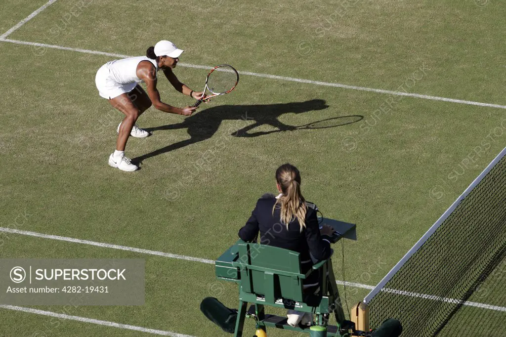 England, London, Wimbledon. An umpire watches the tennis at the Wimbledon Tennis Championships 2008.