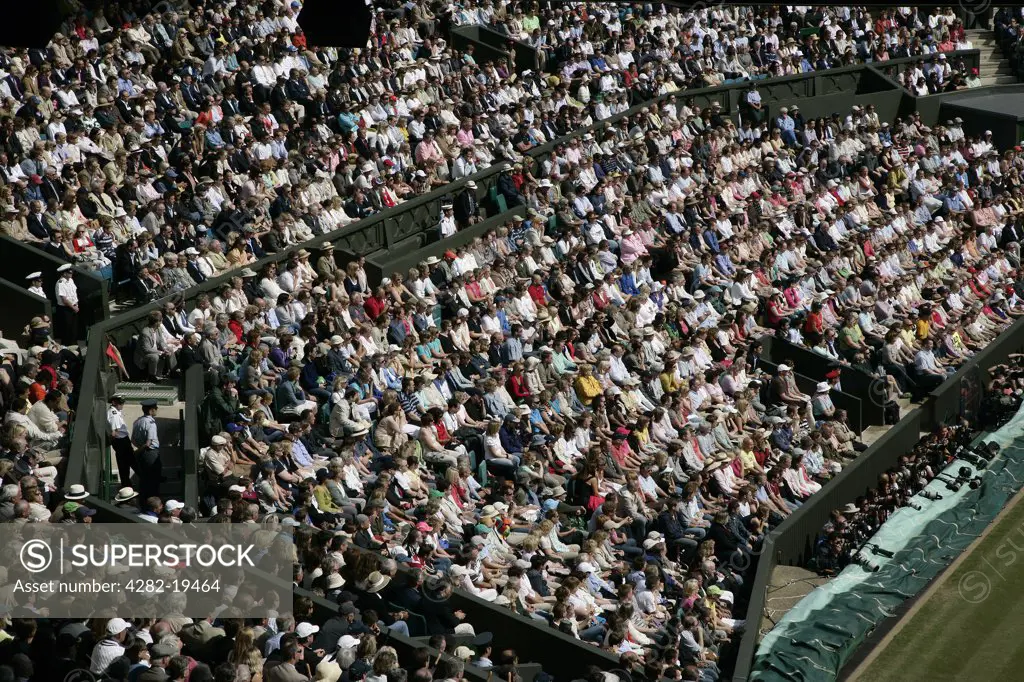England, London, Wimbledon. The crowd watch play on centre court during the Men's Singles Final at the Wimbledon Tennis Championships 2008.