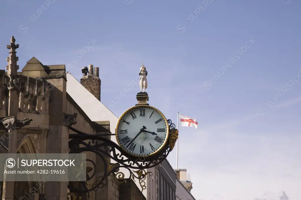 England, Yorkshire, York. Little Admiral Clock on Church of St Martin-le-Grand in Coney Street.