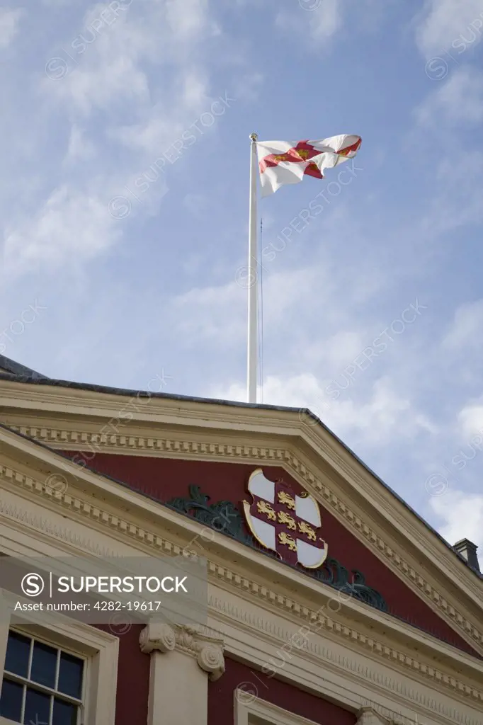 England, Yorkshire, York. Flag of St George flying on Town Hall roof in city centre.