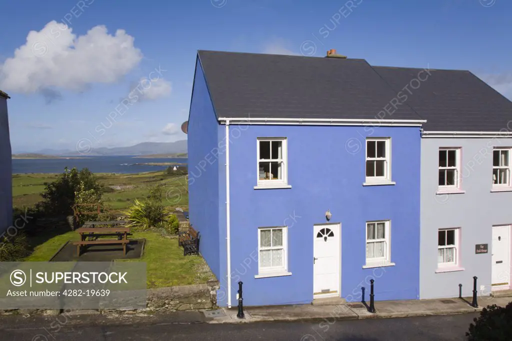 Republic of Ireland, County Cork, Eyeries. Colourful traditional houses in village on Ring of Beara tourist route round Beara peninsula.